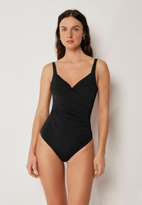 Слитный купальник