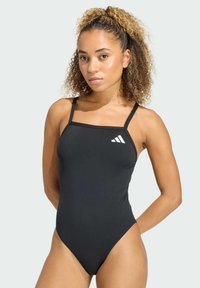 Слитный купальник