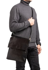 Кожаная сумка