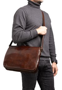 Кожаная сумка