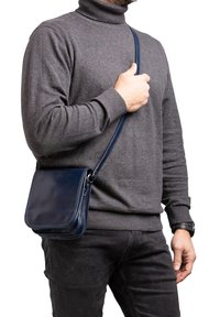 Кожаная сумка