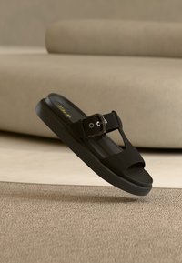 Шлепанцы Шлепанцы