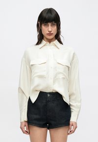 Шелковая блузка