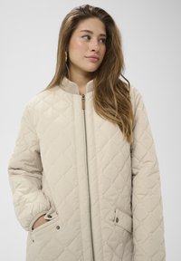 Длинная куртка Длинная куртка