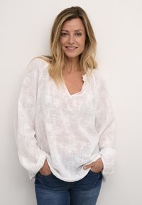 Длинная блузка