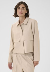 Блейзер с накладными карманами