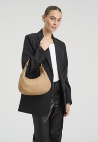 Кожаная сумка Кожаная сумка