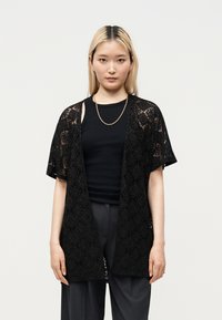 Длинный кардиган Длинный кардиган