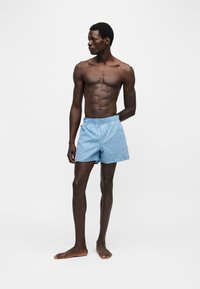 Трусы-боксеры Трусы-боксеры