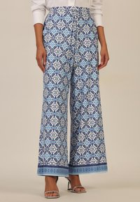 Широкие брюки Широкие брюки