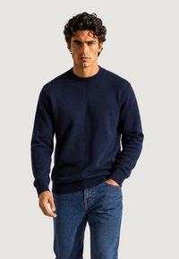 Пуловер